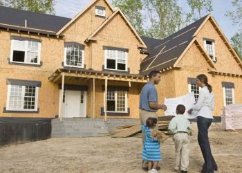 Why is it a good idea to get a loan to build a house