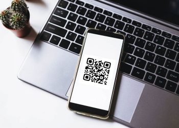 QR code scanning payment and online shopping concept. Mobile pho