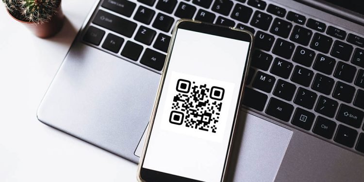 QR code scanning payment and online shopping concept. Mobile pho