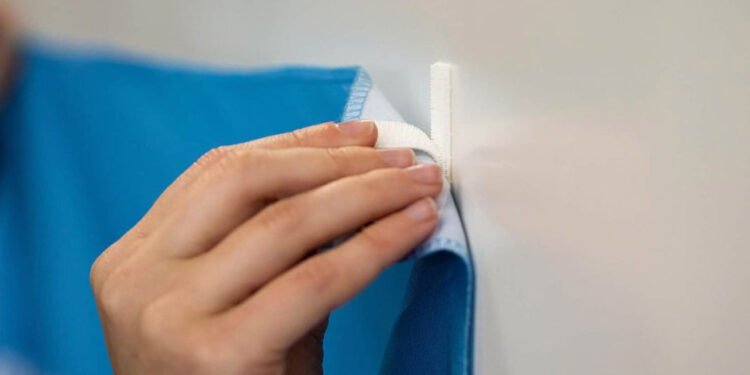 Hang a Banner on a Wall Without Damage