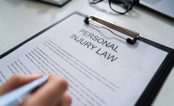 Elevated View Of Paper Of Personal Injury Law